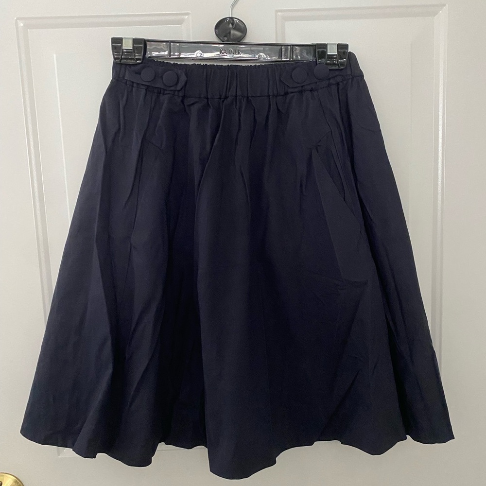 Black skirt with big buttons